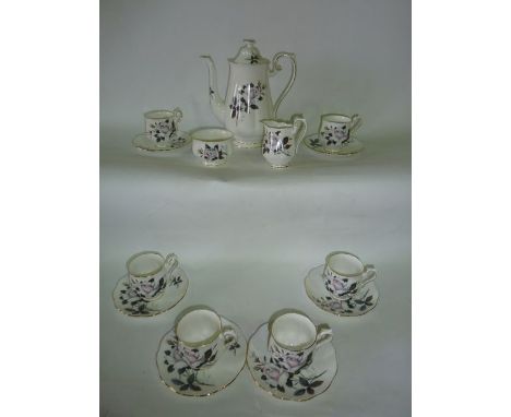 A collection of Royal Albert Queen's Messenger pattern coffee wares comprising coffee pot, cream jug, sugar bowl, six coffee 