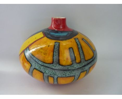 An unusual Poole Pottery vase of onion shaped form with abstract decoration in tones of red, ochre, grey and blue, with print