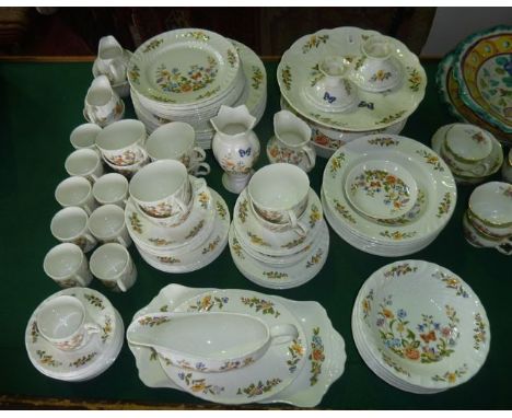 An extensive collection of Aynsley Cottage Garden pattern dinner, tea and coffee wares including a circular comport, sauce bo