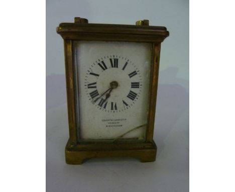 A simple English brass carriage clock with 8-day timepiece