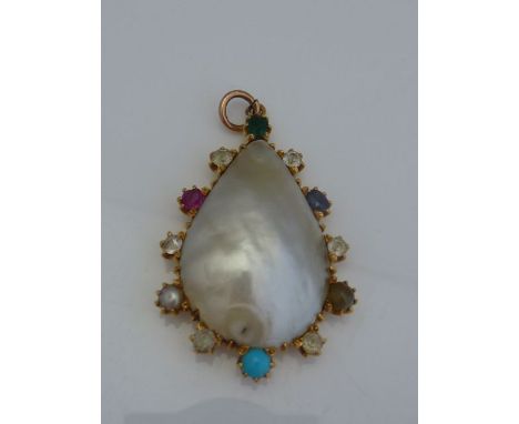 A gem-set mabé pearl pendant, of teardrop form, highlighted with a untested gem-set border of emerald, ruby, sapphire, turquo