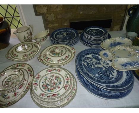 A quantity of early 20th century Bisto blue and white printed Willow pattern dinner wares comprising four oval graduated meat