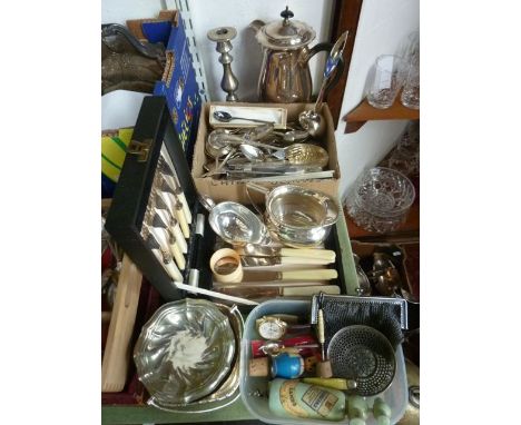 A silver plated hot water jug with ebonised handle, a quantity of assorted cutlery to include a preserve spoon with embossed 
