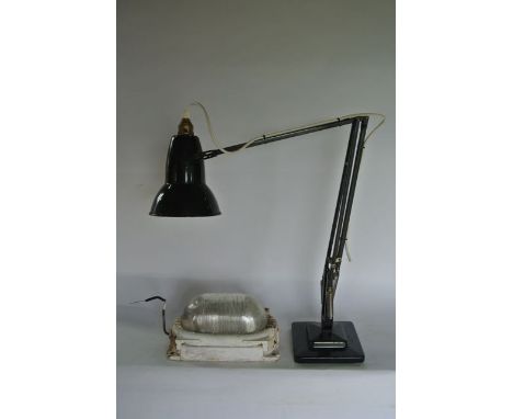 A 20th century angle poise desk lamp with black painted finish, set upon a stepped squared weighted base, stamped to stem The