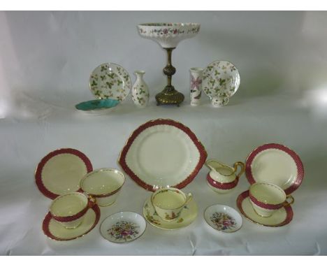 A collection of New Chelsea tea wares with dark pink, gilt and white lattice type border decoration including milk jug, sugar