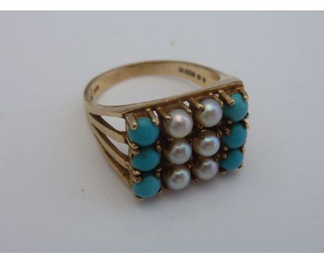 A turquoise and pearl ring, centred with two rows of pearls, flanked to each side with a row of turquoise, in 9ct gold, size 