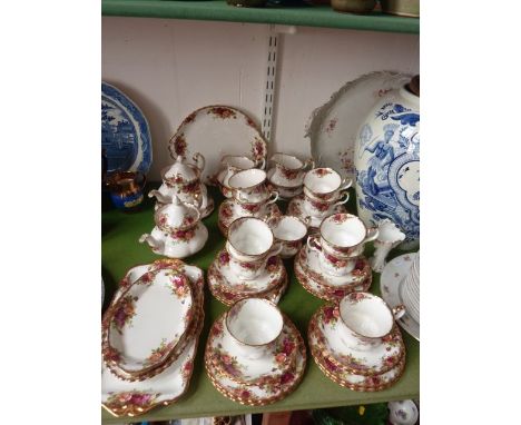 A quantity of Royal Albert Old Country Roses pattern tea wares comprising two teapots, teapot stand, two milk jugs, two sugar