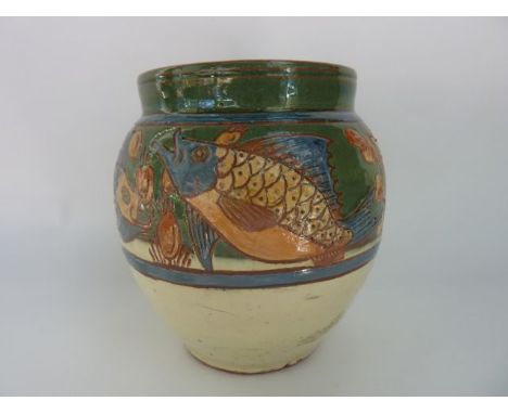 A Brannan Barum ware vase with incised and painted fish and water weed border decoration to the upper section, with incised m