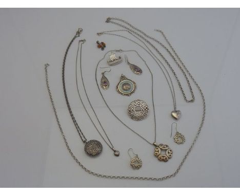 Two sterling silver necklaces, composed of circular links, 9.6g in total; a sterling silver locket on chain, of heart-shaped 