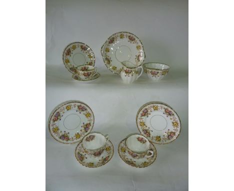 A collection of late 19th century Marne pattern tea wares with printed and infilled floral border decoration comprising milk 