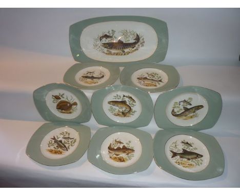 A Norwegian fish set all with various printed freshwater fish decoration comprising a rectangular serving plate and eight pla
