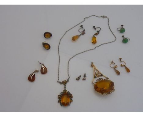 A pair of jade earrings, each of circular form, mounted in 9ct white gold, screw fittings; a pair of gem-set earrings, each s