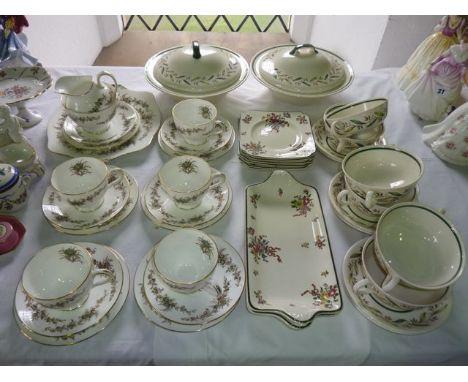 A collection of Minton Greenbriar pattern tea wares comprising milk jug, sugar bowl, cake plate, five cups, six saucers and s