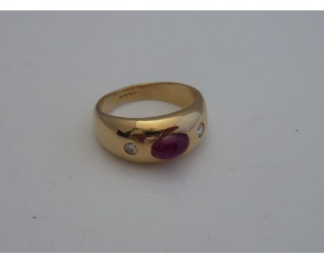 A ruby and diamond gypsy ring, centred with a cabochon ruby weighing approximately 1.29cts, flanked to each side with a round