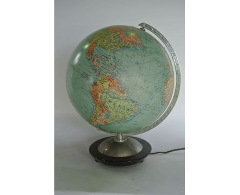 A German vintage desktop light up globe bearing mark Columbus Duo Erdglobus, Berlin Und Stuttgart, raised on a circular timbe