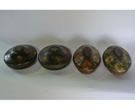 A pair of vintage printed Rowntree tins of circular form with faux lacquered detail upon a background with decoration in the 