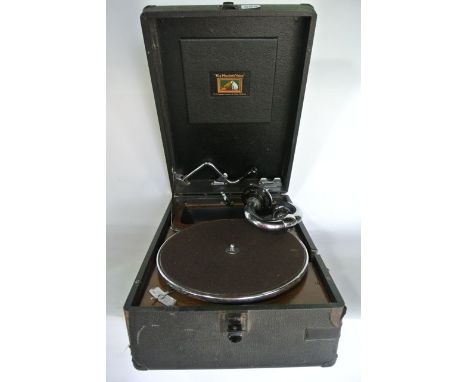 A vintage His Masters Voice table top gramophone set within an ebonised case