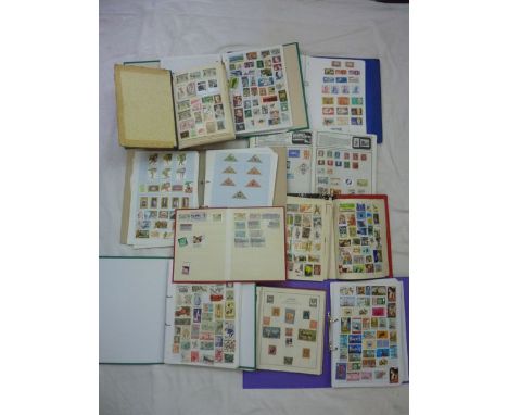 Ten world stamp albums, mostly pages with ring binders, worldwide collection