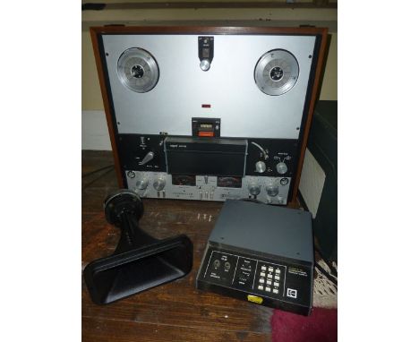 A Ferrograph Super 7 Tape Recorder in a teak wood case, a Kodak S-AV Programmable Dissolve control and a Goodmans Hifax 100HX