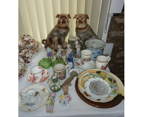 A pair of late 19th century Staffordshire type models of seated pugs with glass eyes together with further ceramics including