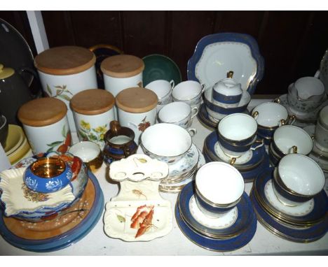 A quantity of ceramics including Royal Worcester Evesham pattern oven to table ware kitchen storage jars with wooden covers, 