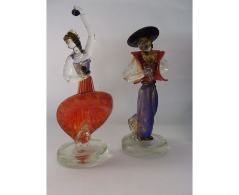 A pair of Italian 20th century studio glass figures of dancers, one a female depicted in brightly coloured dress highlighted 