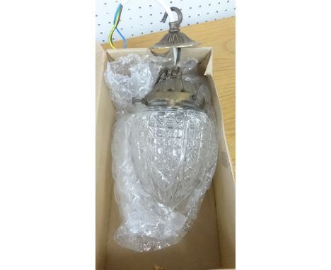 A cut glass hanging hallway lamp modified for electric.