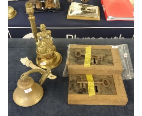 Three antique church door locks with keys, also a small brass bell and a brass figure table lamp (5).