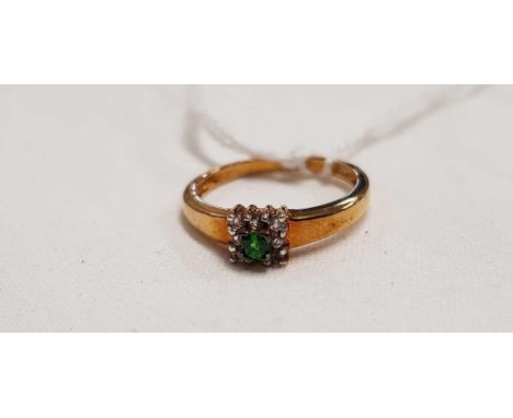 AN EMERALD & DIAMOND 9 STONE RING SET IN 9ct, SIZE 'N'