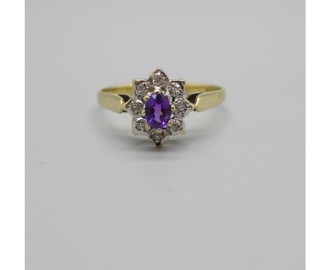 A 9ct gold, amethyst and diamond ring, 1.5g, M 