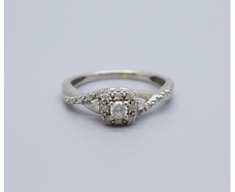 A 9ct gold and diamond ring, 2g, M 