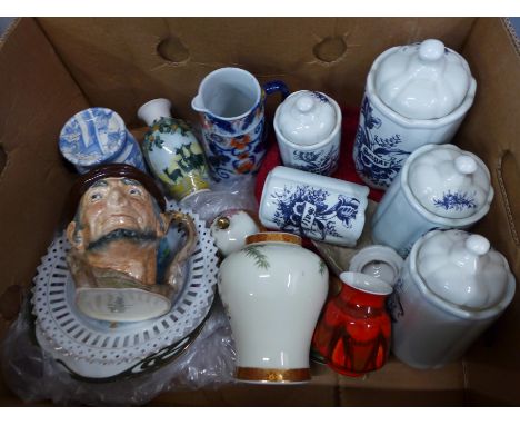 A set of five Delft Bleau storage jars, a small Franz dish, a lidded vase, decorative plates, a small Poole vase, a Royal Dou