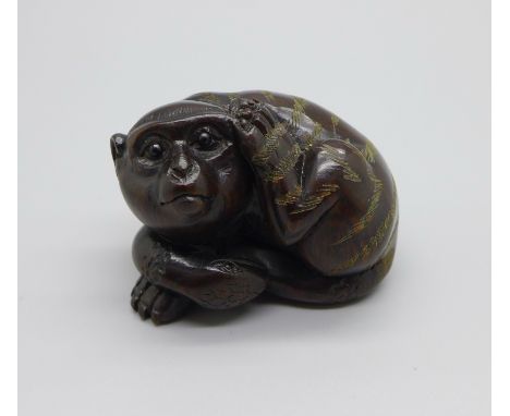 A signed Japanese monkey netsuke 
