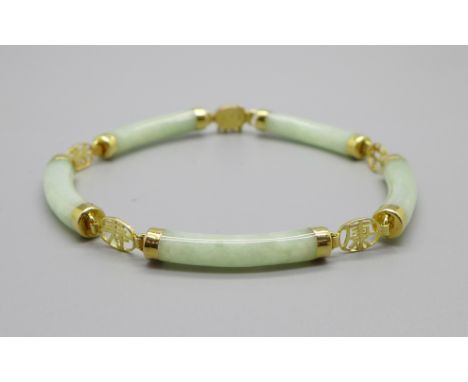 A 14ct gold and jade bracelet 