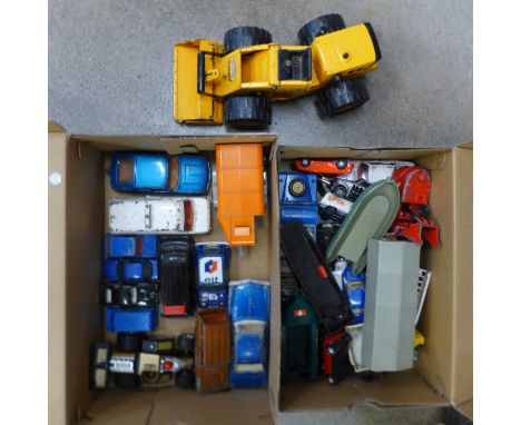 A collection of die-cast model vehicles including Dinky, Corgi, Britains and Lone Star, and a Tonka digger, playworn 