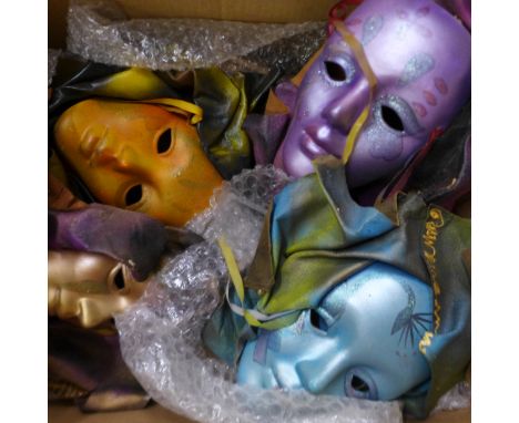 A collection of masks and a Star Wars Darth Maul ceramic money bank, boxed 