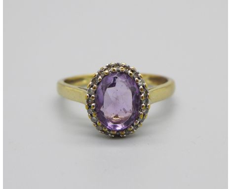 A 9ct gold, amethyst and diamond cluster ring, 1.8g, M 