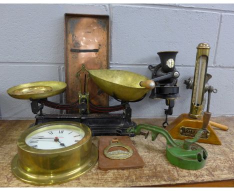 A set of Avery balance scales, a Spong coffee mill and slicer, an Acctim quartz wall clock and a brass mounted thermometer 