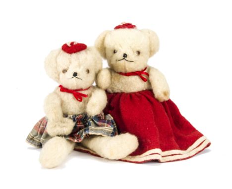 Two interesting Chilprufe teddy bears, both with cream wool plush, orange ad black glass eyes, black stitched nose and mouth 