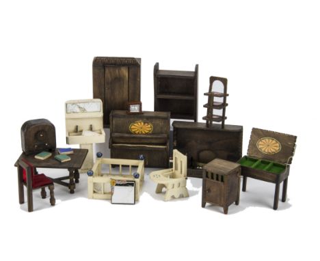 A quantity of Pit-A-Pat furniture: including radio, cutlery box on legs, fireplace with club fender, table, book case, chair 