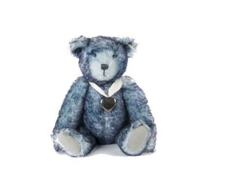 A Steiff Limited Edition for North America Forget me not teddy bear, with silver locket, 476 of 3000, in original box with ce