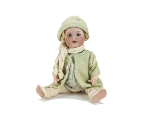 An Armand Marseille 996 character toddler, with blue lashed sleeping eyes, trembling tongue, blonde mohair wig, composition s
