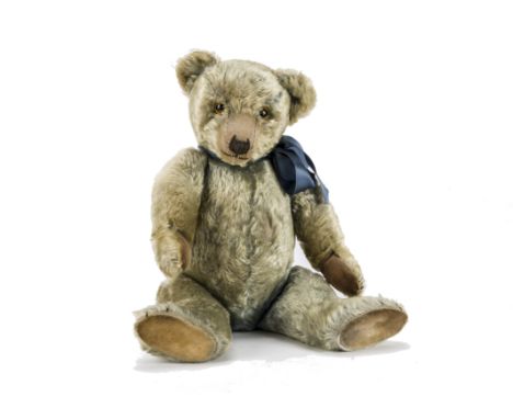 A rare Chiltern Hugmee blue mohair musical teddy bear 1930s, with pale orange and black glass eyes, pronounced clipped muzzle