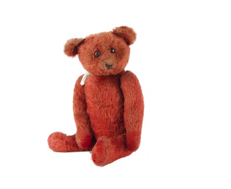 A rare early German red mohair teddy bear 1910-20s, with black boot button eyes, black stitched nose, mouth and claws, swivel