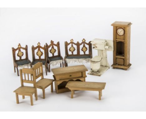 Dolls’ house furniture: a painted cream wooden lavatory -4½in. (11.5cm.) high (slight damage and paint flaking); a light oak 