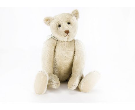 ‘Beau’, a rare early large Steiff white mohair teddy bear, with black boot button eyes, pronounced clipped muzzle, brown stit