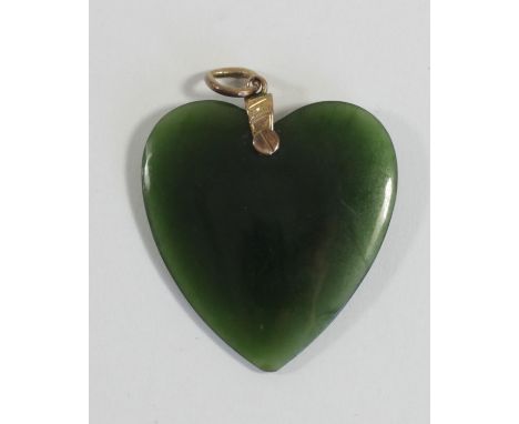 A 9ct gold mounted nephrite jade pendant, 30 x 30mm 