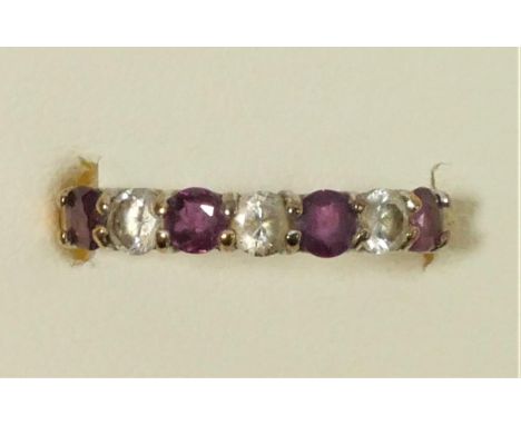 A 9ct gold ruby and CZ dress ring, M, 1.3gm 