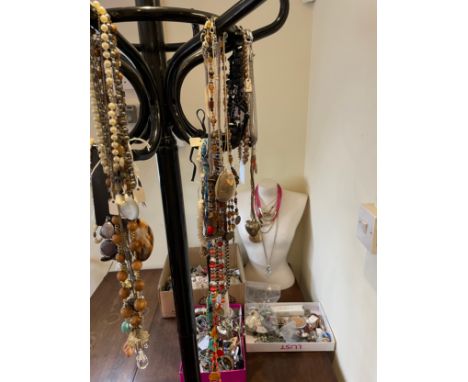 A collection of costume jewellery to include earrings, bracelets, rings and necklaces. (2) (props not included) 