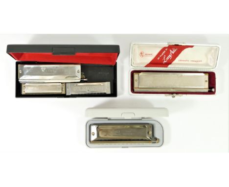 A collection of five harmonica's to include a "Larry Adler" chromatic by M. Hohner (Germany) cased, a Qimel 1248 chromatic ha